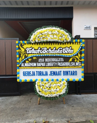 Papan Bunga Duka di Padamara